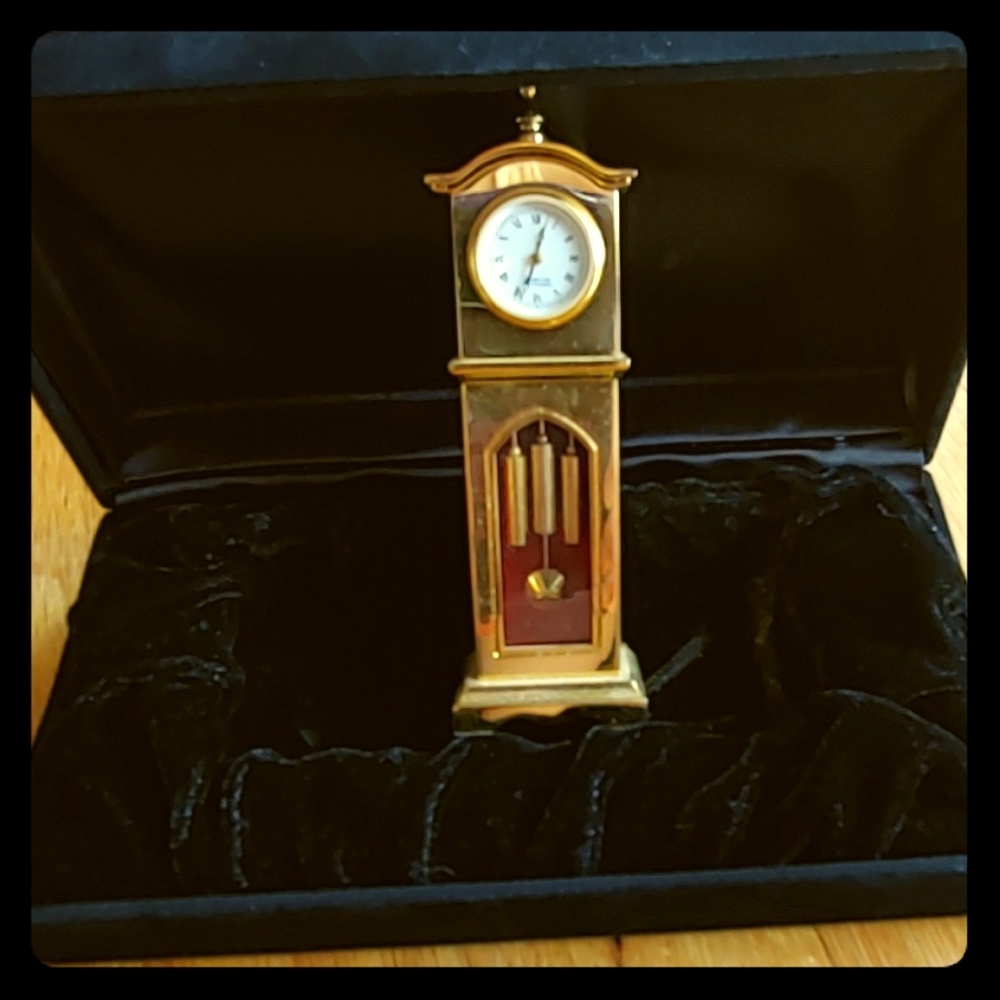 Miniature gold-toned clock